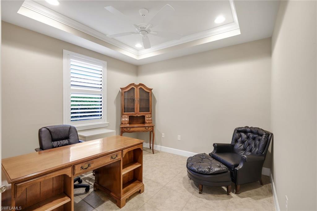 10820 Rutherford Road Fort Myers, FL 33913 - Photo 30 of 42 Tray ceiling with recessed lighting and ceiling fan