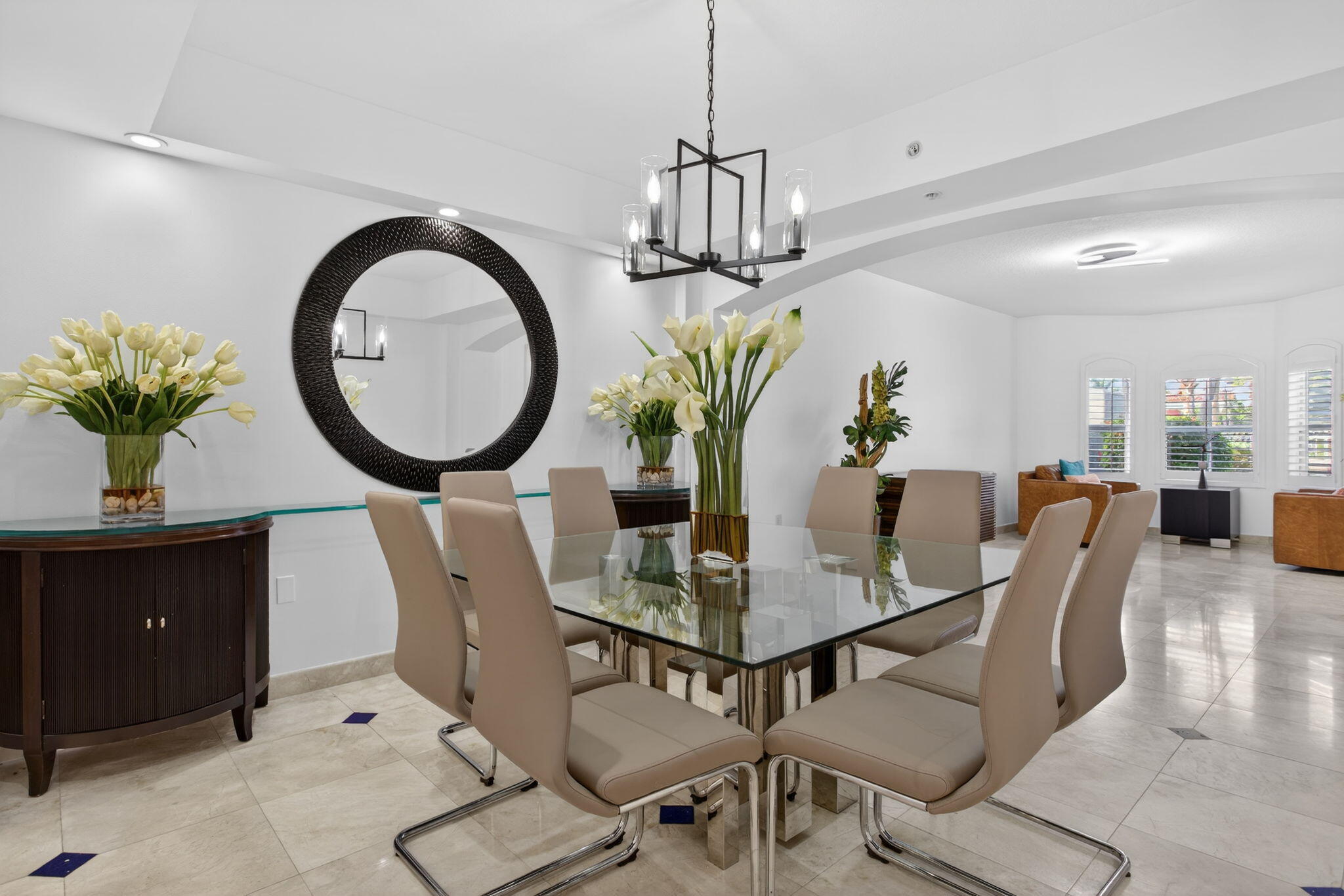 2051 Southeast 3rd Street, Unit TH8 Deerfield Beach, FL 33441 - Photo 16 of 58 a dining room with furniture a chandelier and wooden floor