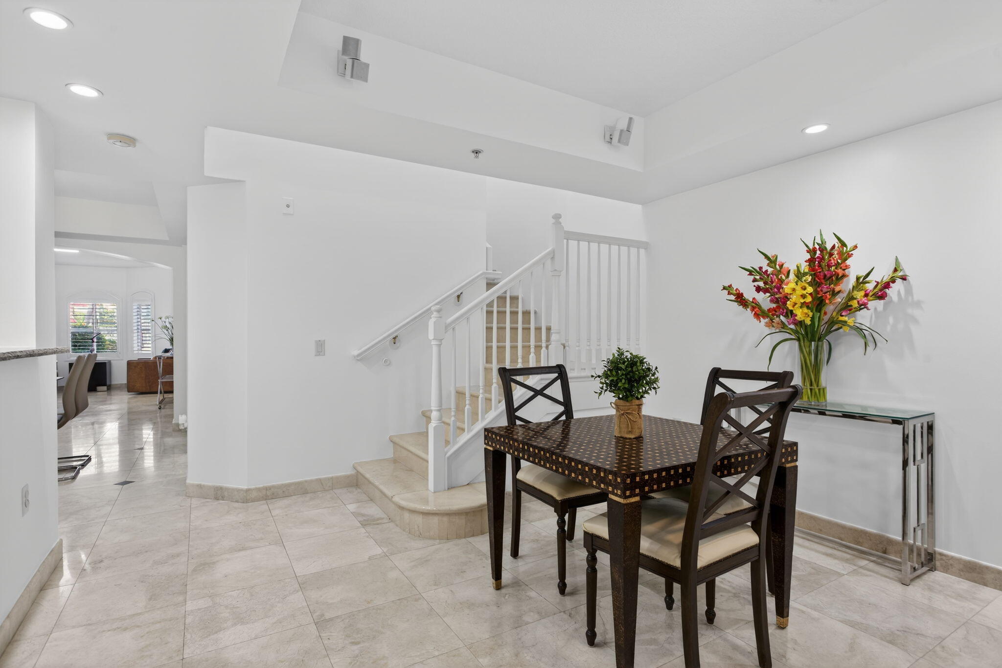2051 Southeast 3rd Street, Unit TH8 Deerfield Beach, FL 33441 - Photo 20 of 58 a view of a dining room with furniture