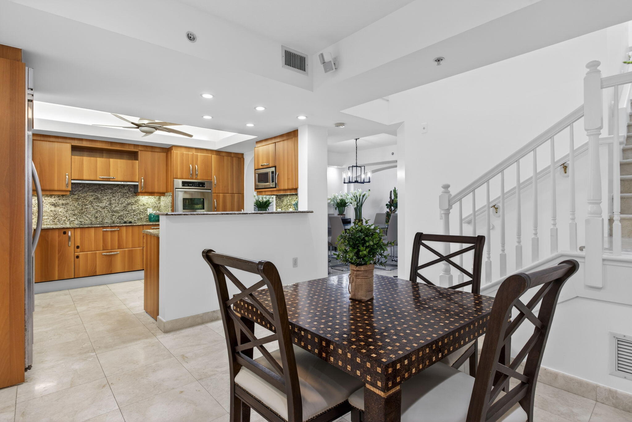 2051 Southeast 3rd Street, Unit TH8 Deerfield Beach, FL 33441 - Photo 21 of 58 a dining room with furniture and window