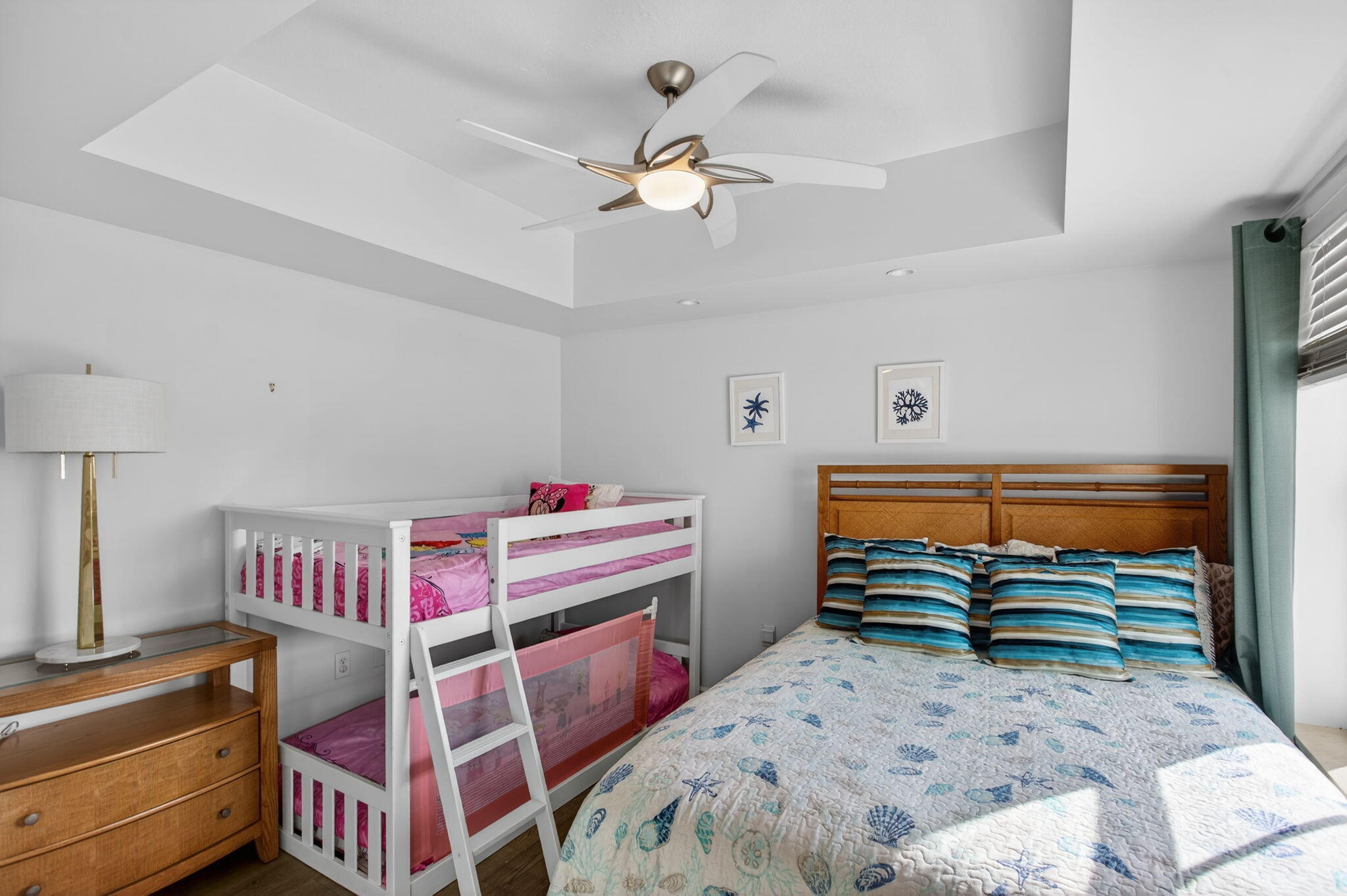 2051 Southeast 3rd Street, Unit TH8 Deerfield Beach, FL 33441 - Photo 36 of 58 a bedroom with a bed and a chandelier