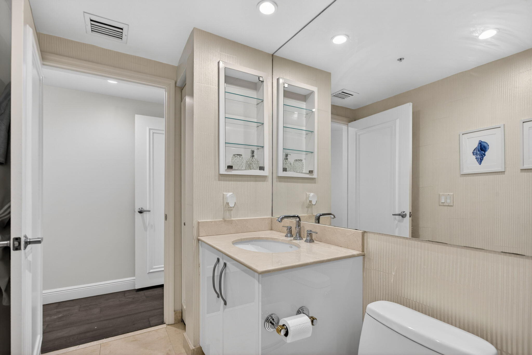 2051 Southeast 3rd Street, Unit TH8 Deerfield Beach, FL 33441 - Photo 38 of 58 a bathroom with a sink a toilet and shower