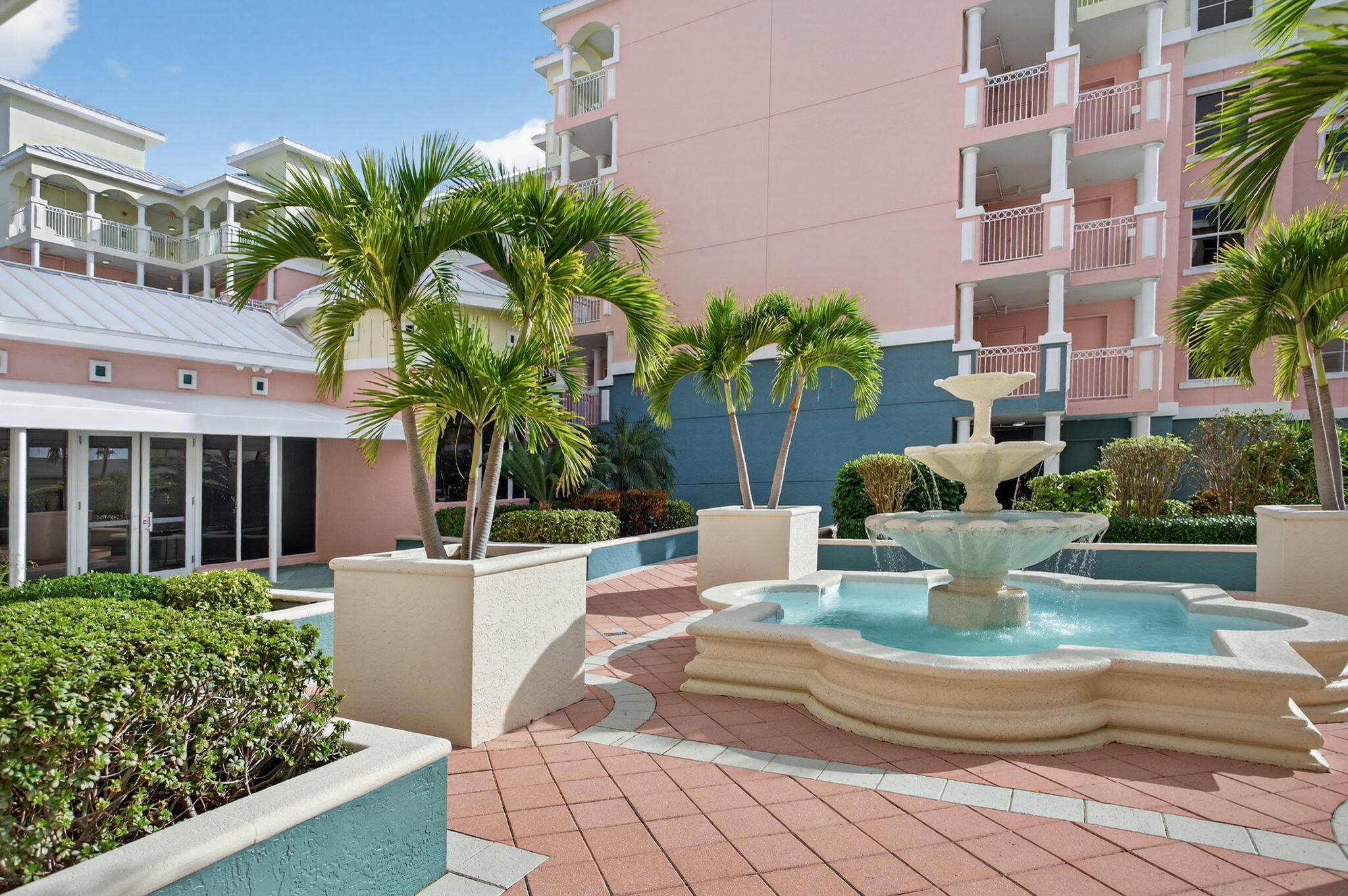 2051 Southeast 3rd Street, Unit TH8 Deerfield Beach, FL 33441 - Photo 47 of 58 a view of a house with backyard and sitting area