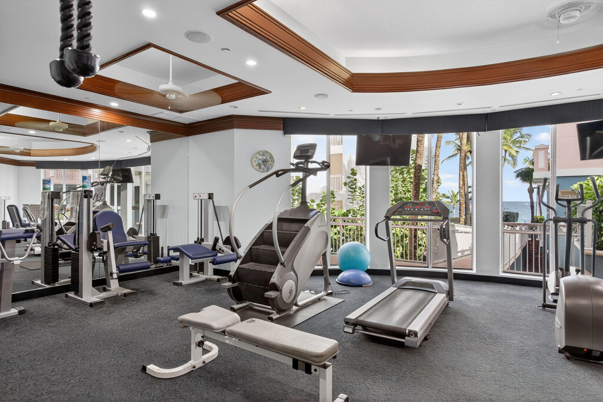2051 Southeast 3rd Street, Unit TH8 Deerfield Beach, FL 33441 - Photo 48 of 58 a view of a room with gym equipment
