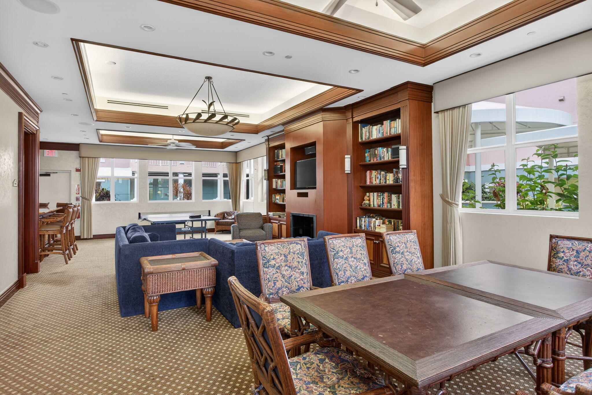 2051 Southeast 3rd Street, Unit TH8 Deerfield Beach, FL 33441 - Photo 49 of 58 a view of a dining room with furniture window and wooden floor