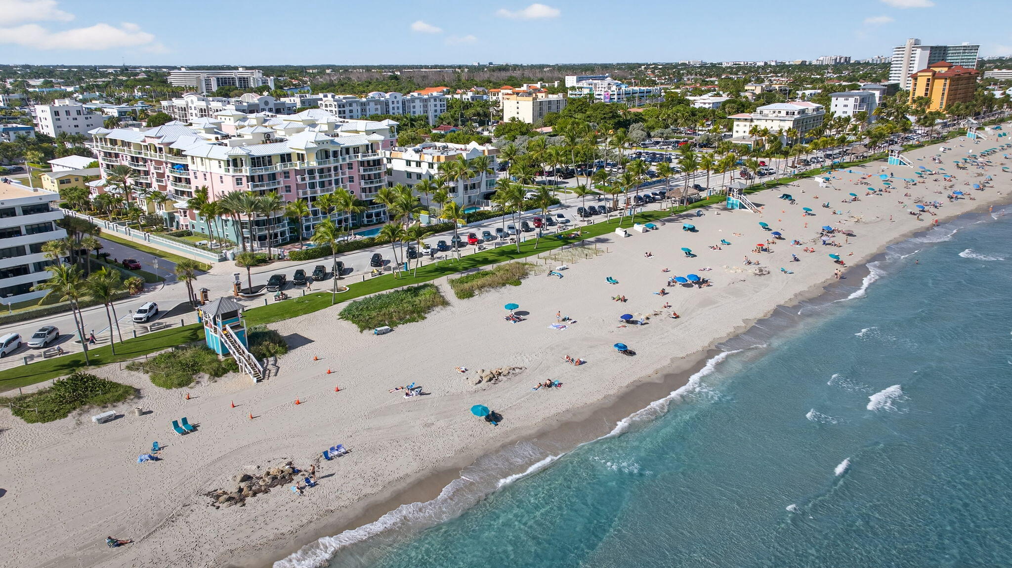 2051 Southeast 3rd Street, Unit TH8 Deerfield Beach, FL 33441 - Photo 57 of 58 a city view with tall buildings