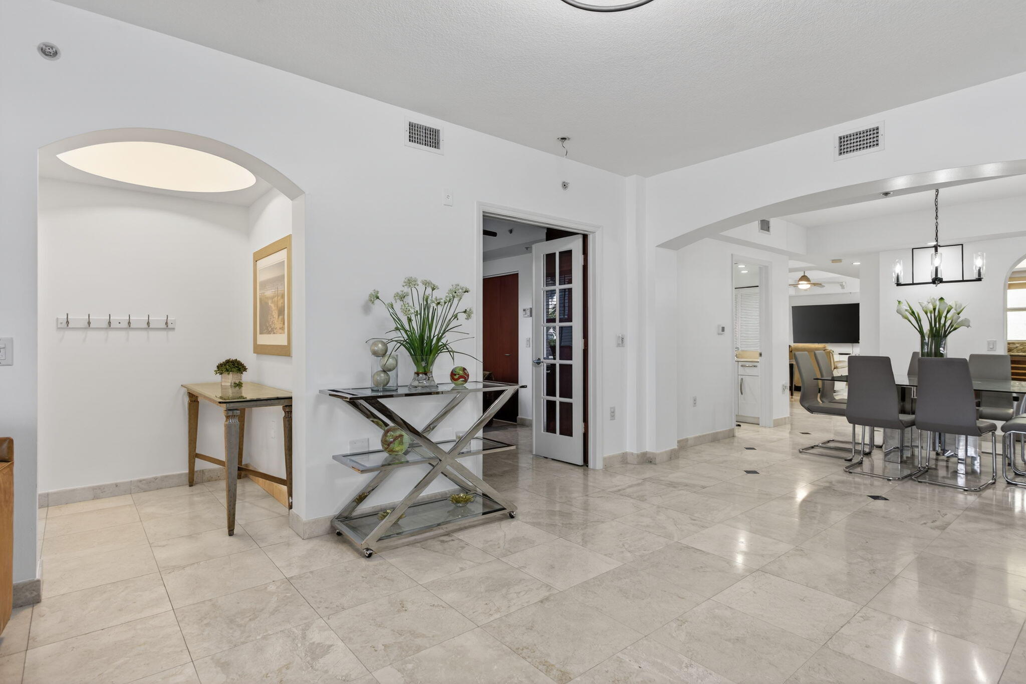 2051 Southeast 3rd Street, Unit TH8 Deerfield Beach, FL 33441 - Photo 7 of 58 a view of a livingroom with furniture and a stove