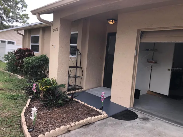 a view of a entryway in front of house