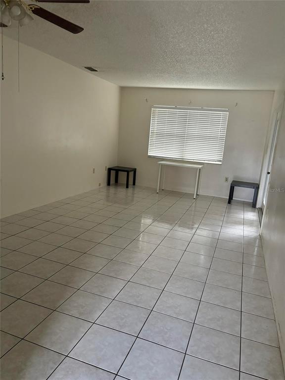 6024 Georgia Avenue New Port Richey, FL 34653 - Photo 3 of 22 an empty room with windows