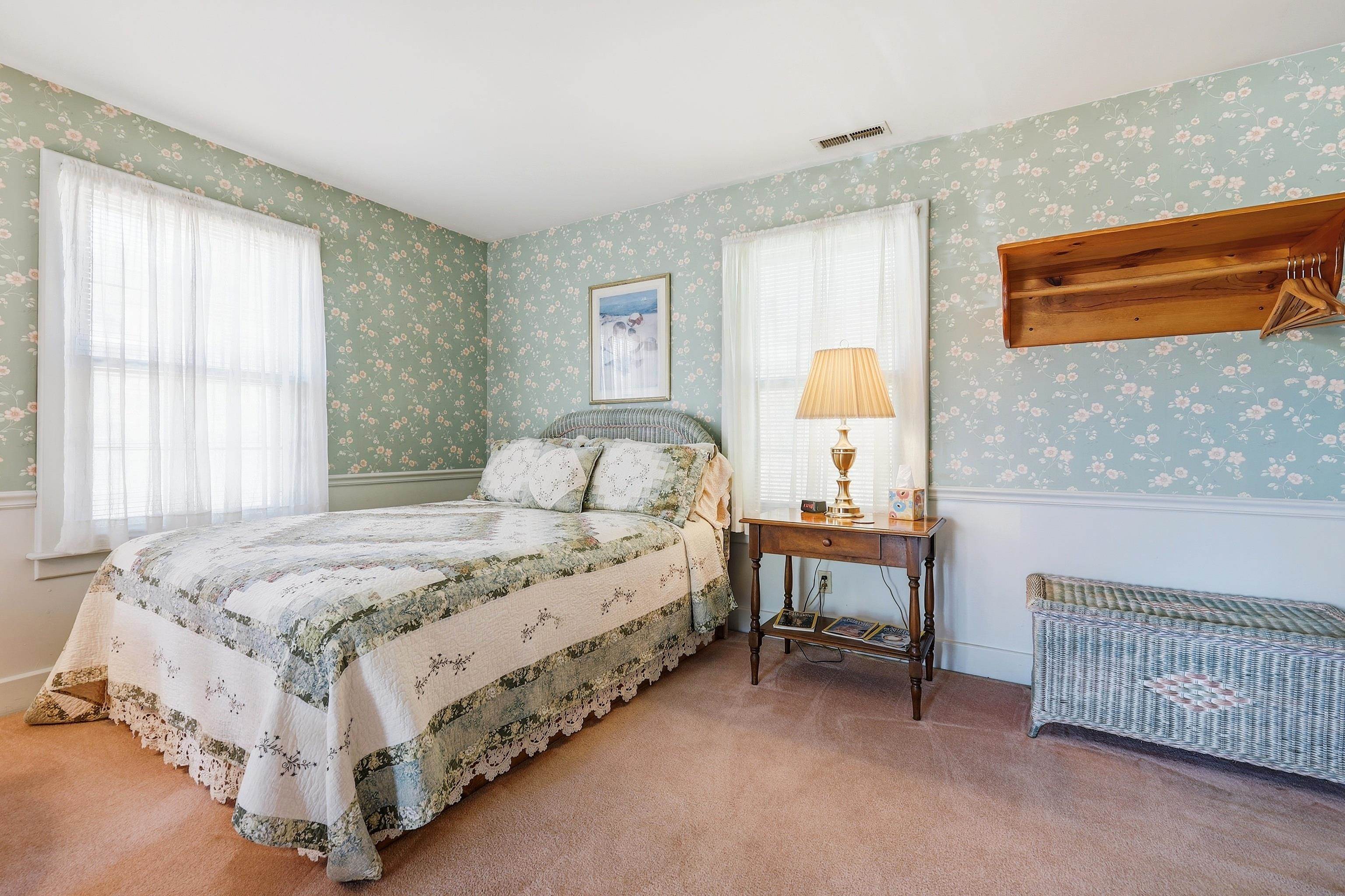 341 Spring Street Galena, IL 61036 - Photo 15 of 35 a bedroom with a bed and a window