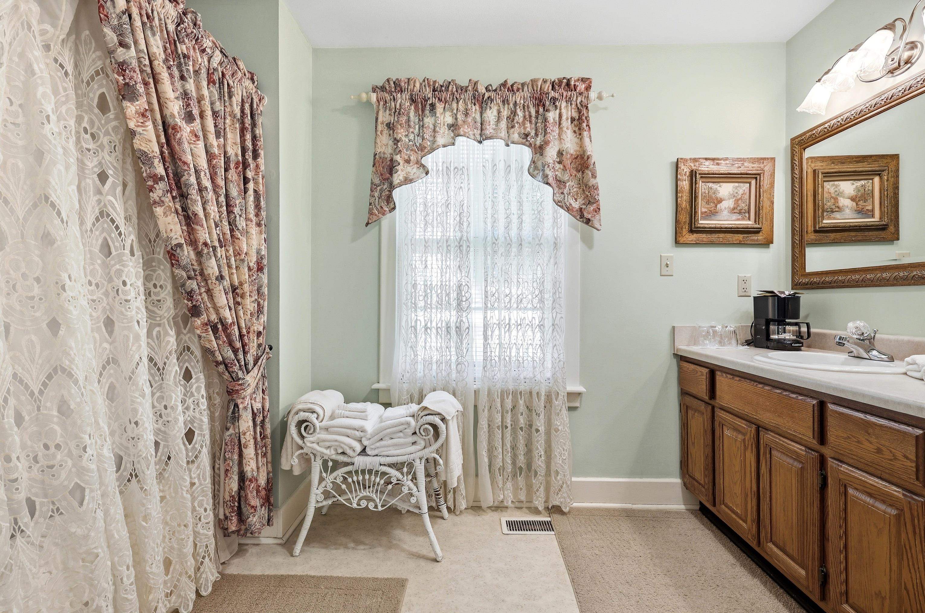 341 Spring Street Galena, IL 61036 - Photo 28 of 35 a bedroom with a bed and a mirror