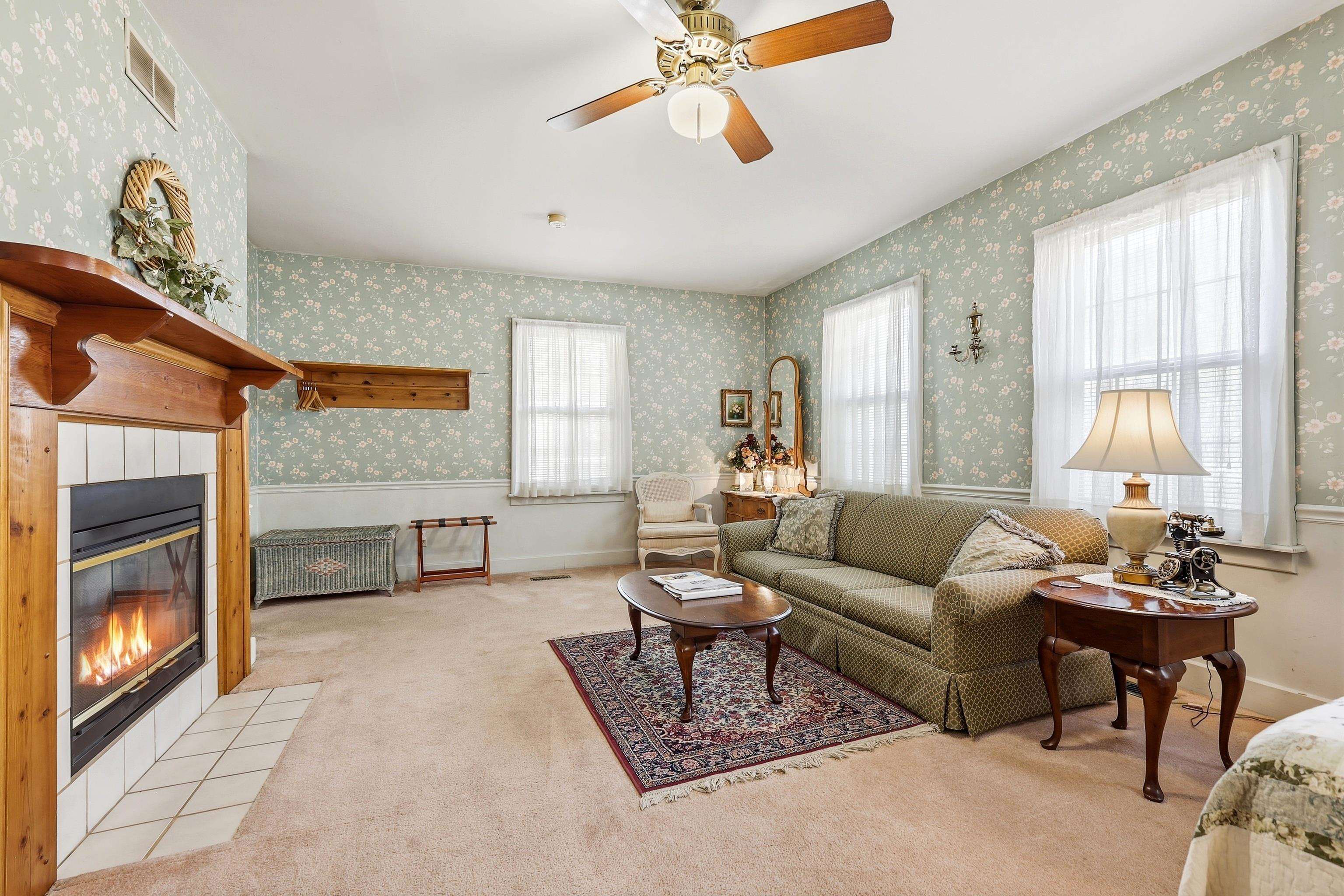 341 Spring Street Galena, IL 61036 - Photo 7 of 35 a living room with furniture and a fireplace