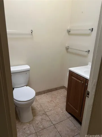 a bathroom with a toilet and a sink