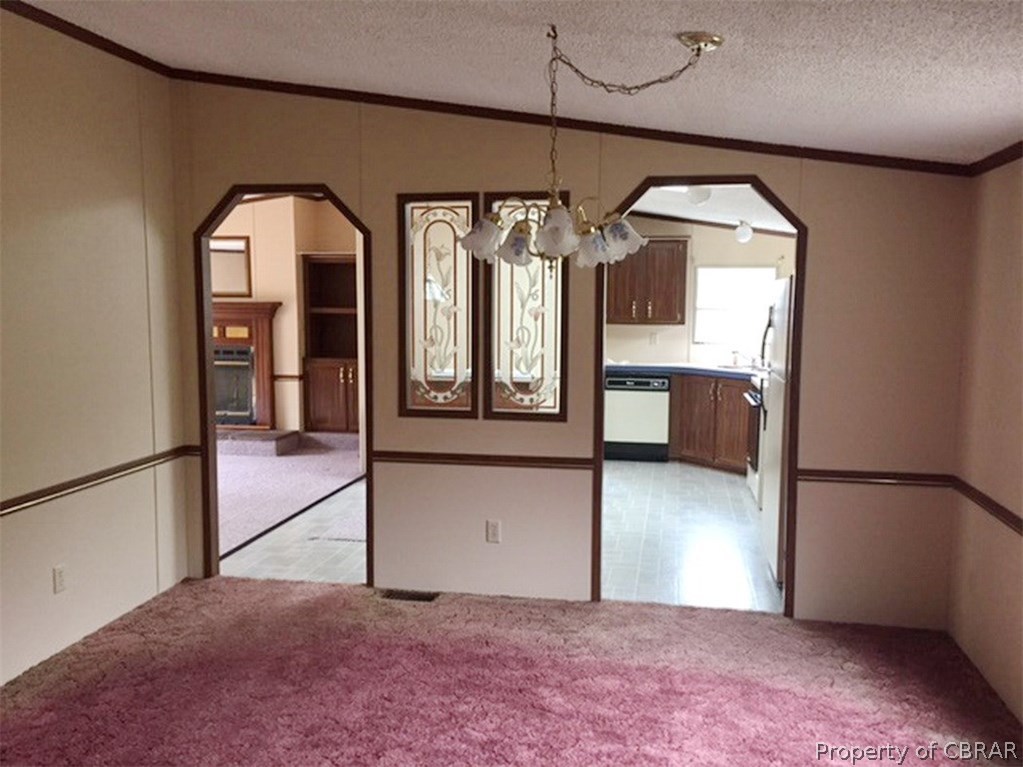 Entrance to the dining room just off the den and kitchen.