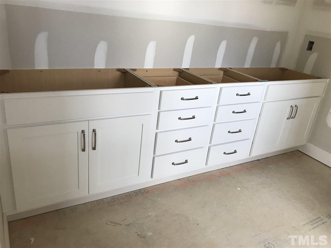 429 Slick Rock Road Wendell, NC 27591 - Photo 14 of 19 Double vanities and double drawer stacks - this bathroom does not lack storage!