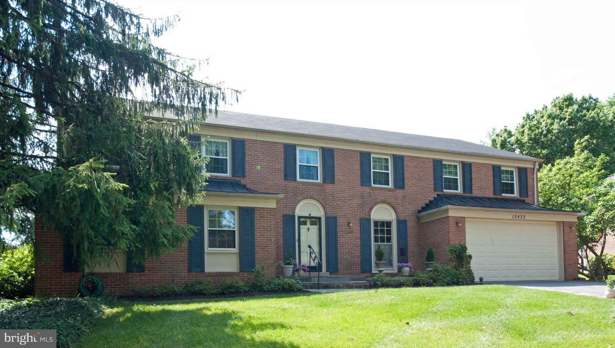 12433 Over Ridge Road Potomac, MD 20854 - Photo 2 of 30 front view of a house with a yard