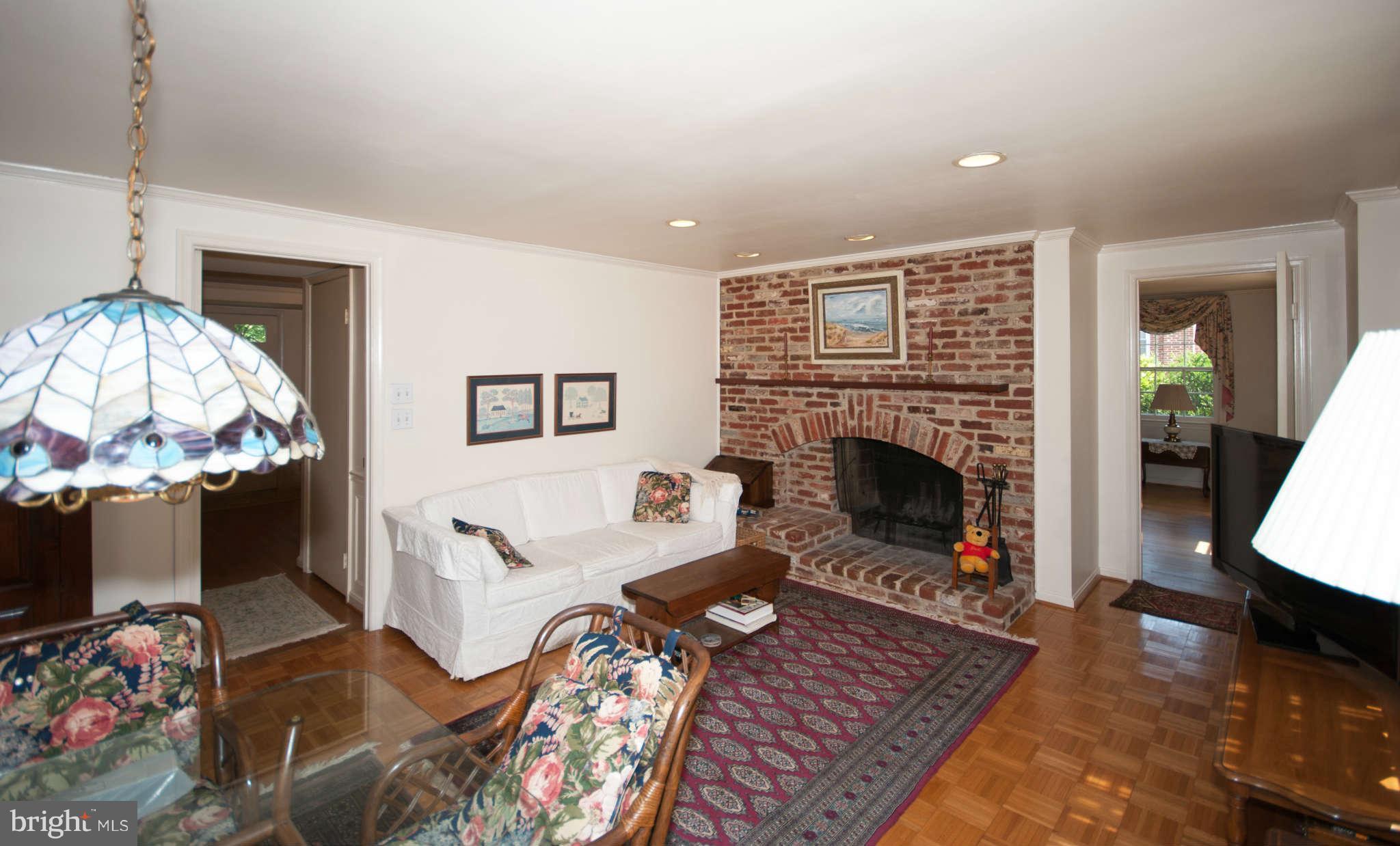 12433 Over Ridge Road Potomac, MD 20854 - Photo 14 of 30 a living room with furniture fireplace and flat screen tv