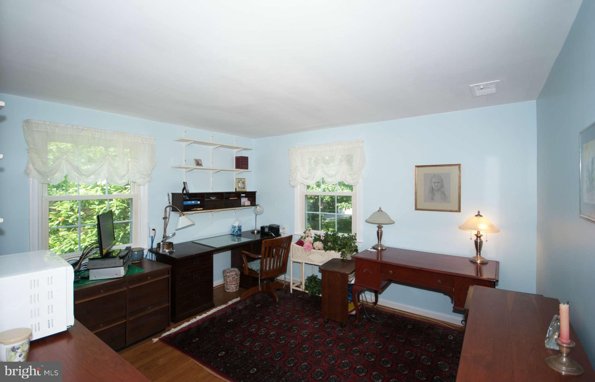 12433 Over Ridge Road Potomac, MD 20854 - Photo 19 of 30 a living room with furniture window and a potted plant