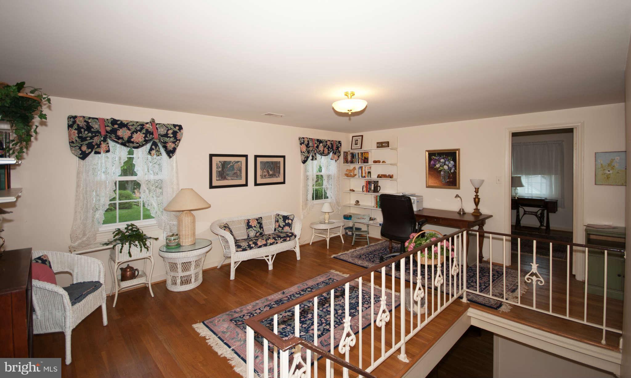 12433 Over Ridge Road Potomac, MD 20854 - Photo 24 of 30 a living room with furniture and wooden floor