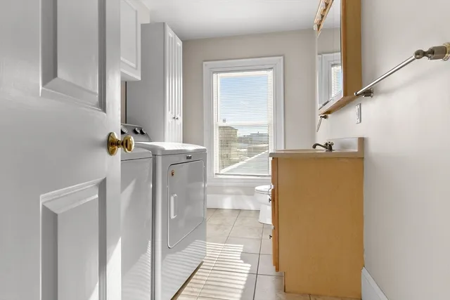a view of a storage & utility room with washer and dryer