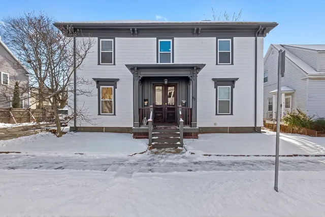 a front view of a house with patio