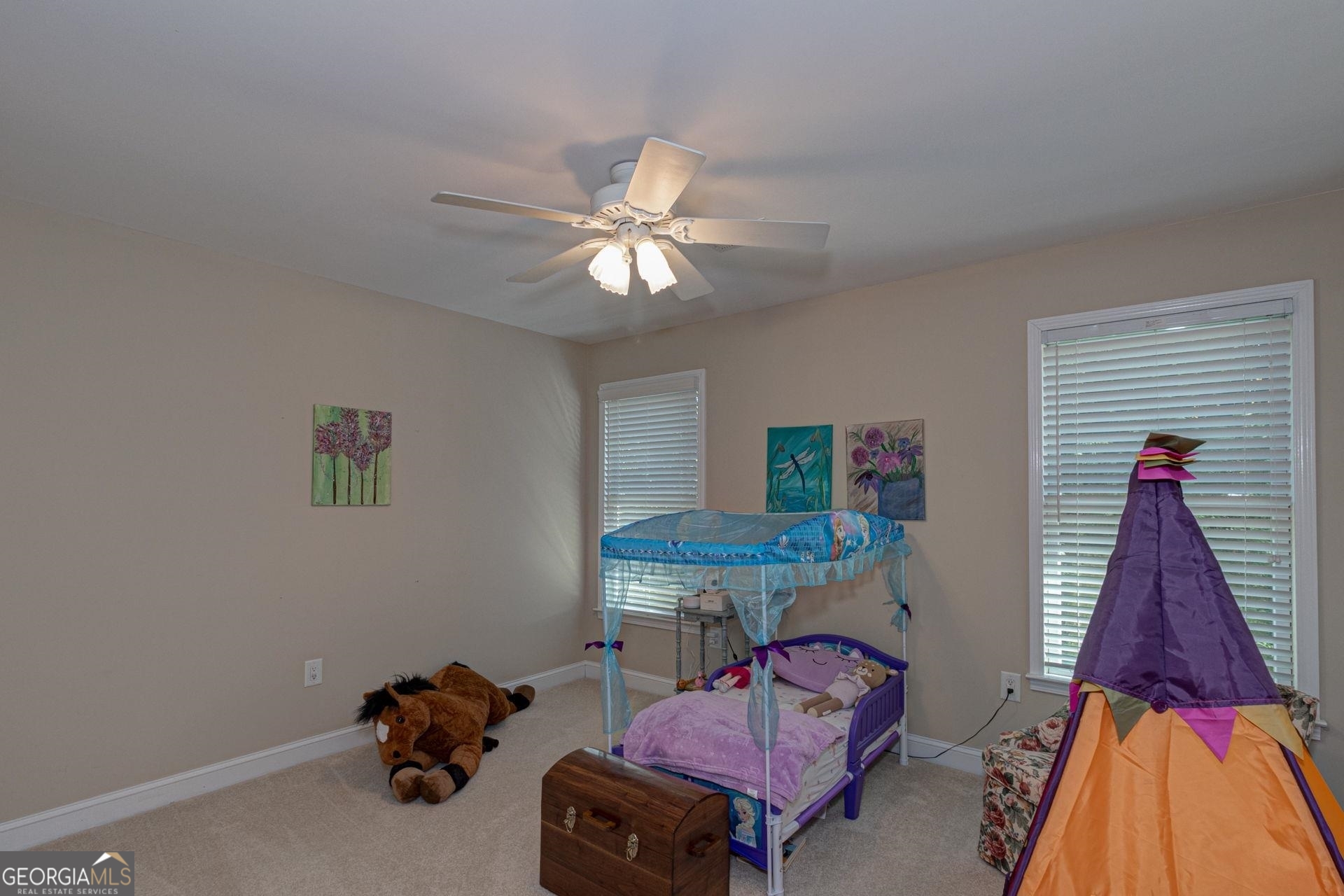 551 Mountain Ridge Drive Manchester, GA 31816 - Photo 35 of 72 Nice sized guest bedroom with lots of light. Just outside the bedroom in the hall is a huge walk in closet.