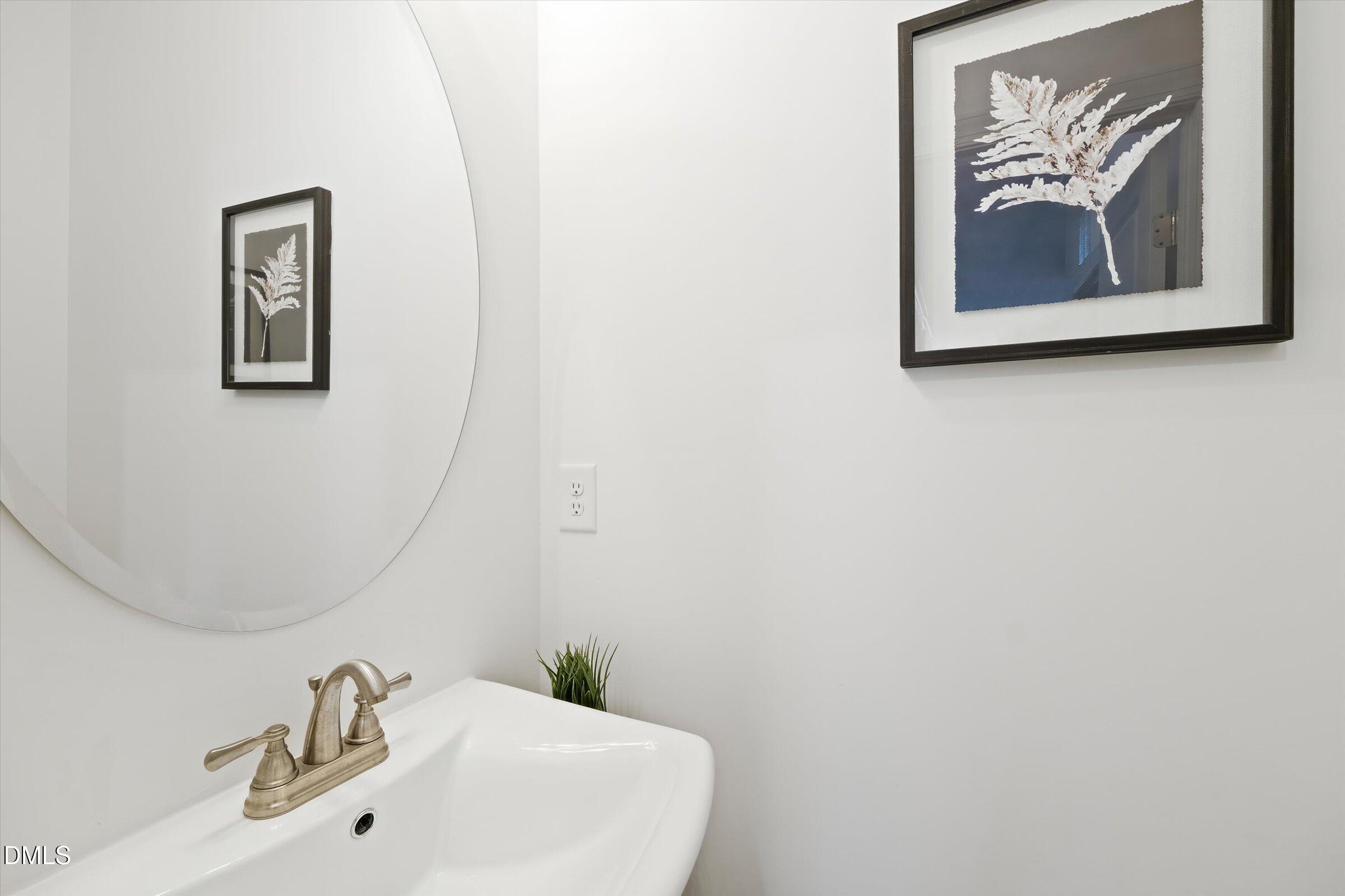 116 Nairn Street Fayetteville, NC 28311 - Photo 20 of 56 a bathroom with a sink and a mirror
