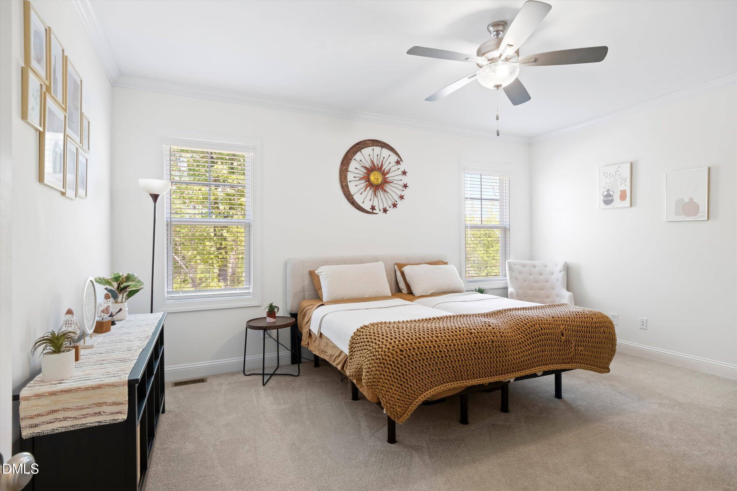 116 Nairn Street Fayetteville, NC 28311 - Photo 21 of 56 a bedroom with a bed table chair and a window