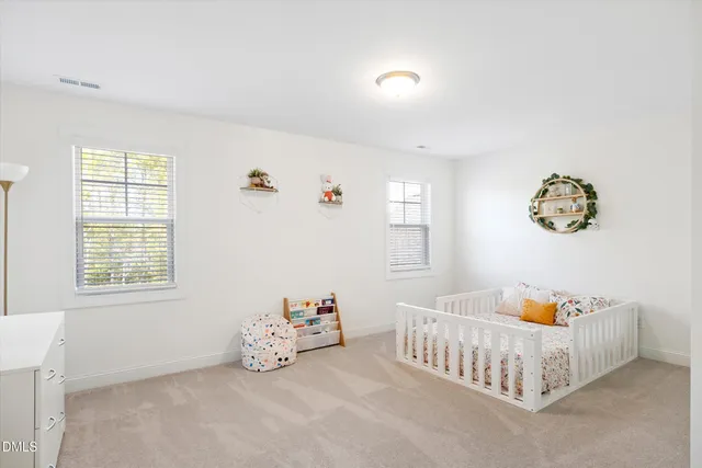 a room with toys and two windows