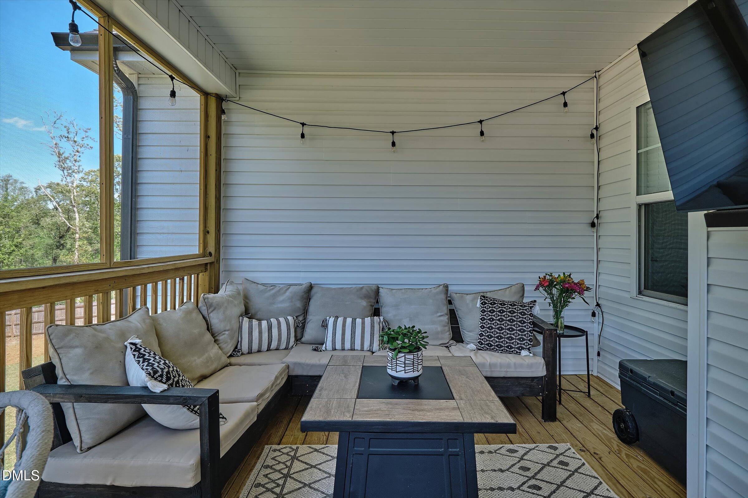 116 Nairn Street Fayetteville, NC 28311 - Photo 47 of 56 a view of a patio with couple of chairs and a potted plant