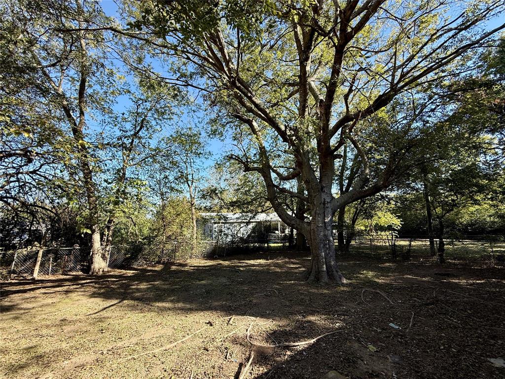 208 West Main Street Cumby, TX 75433 - Photo 24 of 24 a view of road with trees