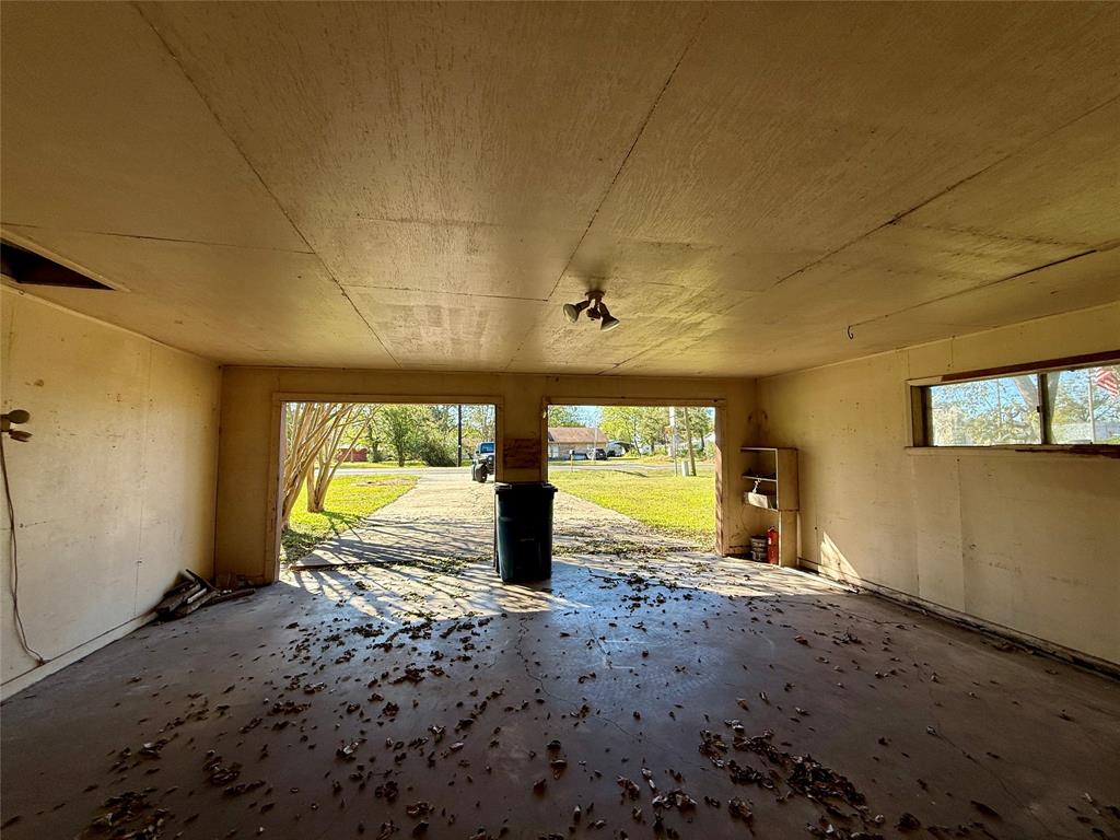 208 West Main Street Cumby, TX 75433 - Photo 3 of 24 a view of a room with window & chandelier