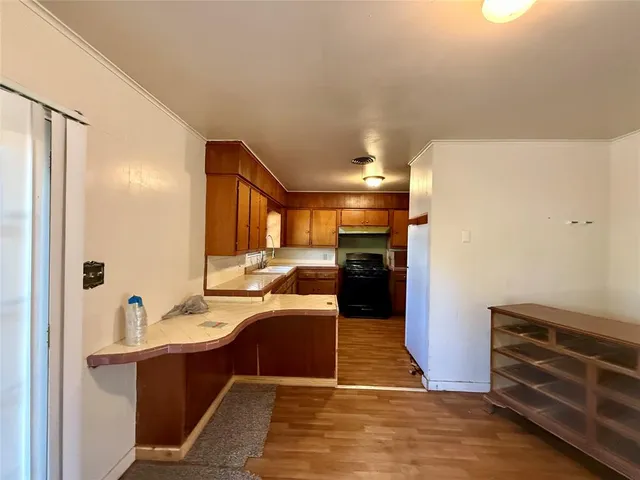 a view of kitchen and dining room