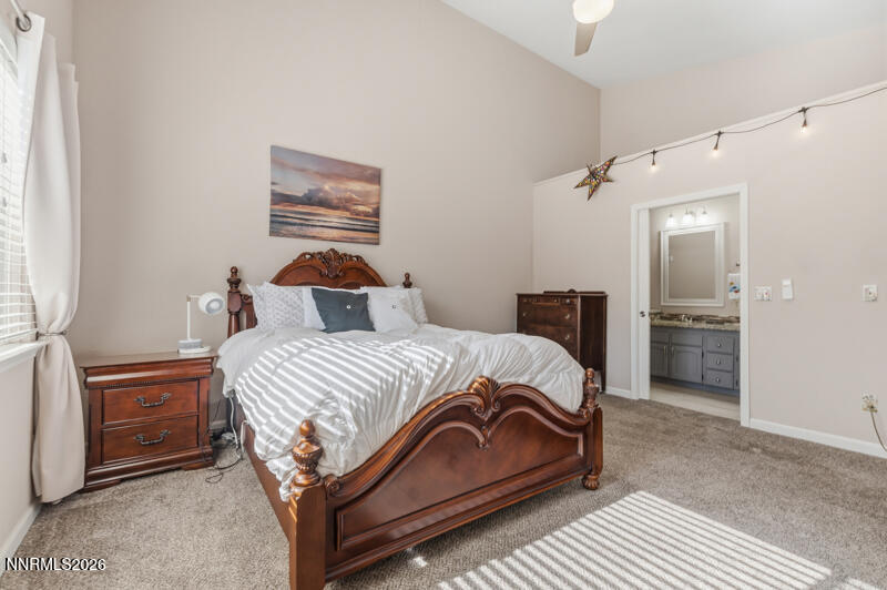 675 College Drive Reno, NV 89503 - Photo 18 of 30 a bedroom with a bed and cabinet