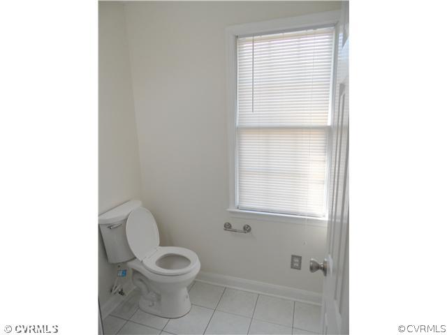 5508 Takach Road Prince George, VA 23875 - Photo 7 of 11 a white toilet sitting next to a window
