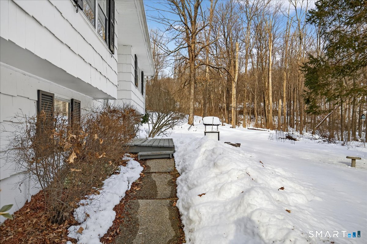 31 Longview Drive Ridgefield, CT 06877 - Photo 9 of 39 a view of road with trees