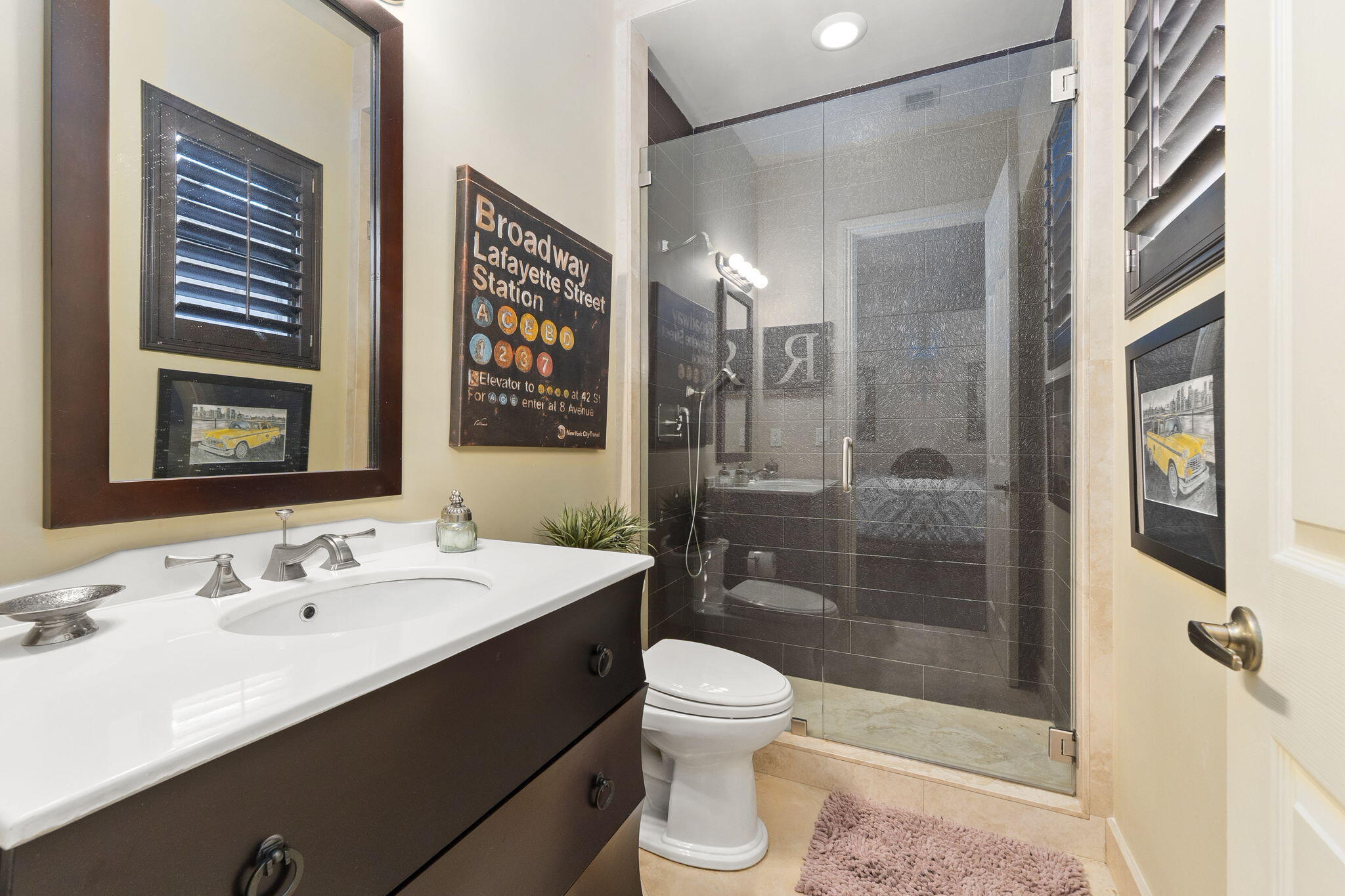 9289 Equus Circle Boynton Beach, FL 33472 - Photo 35 of 72 a bathroom with a sink and a mirror