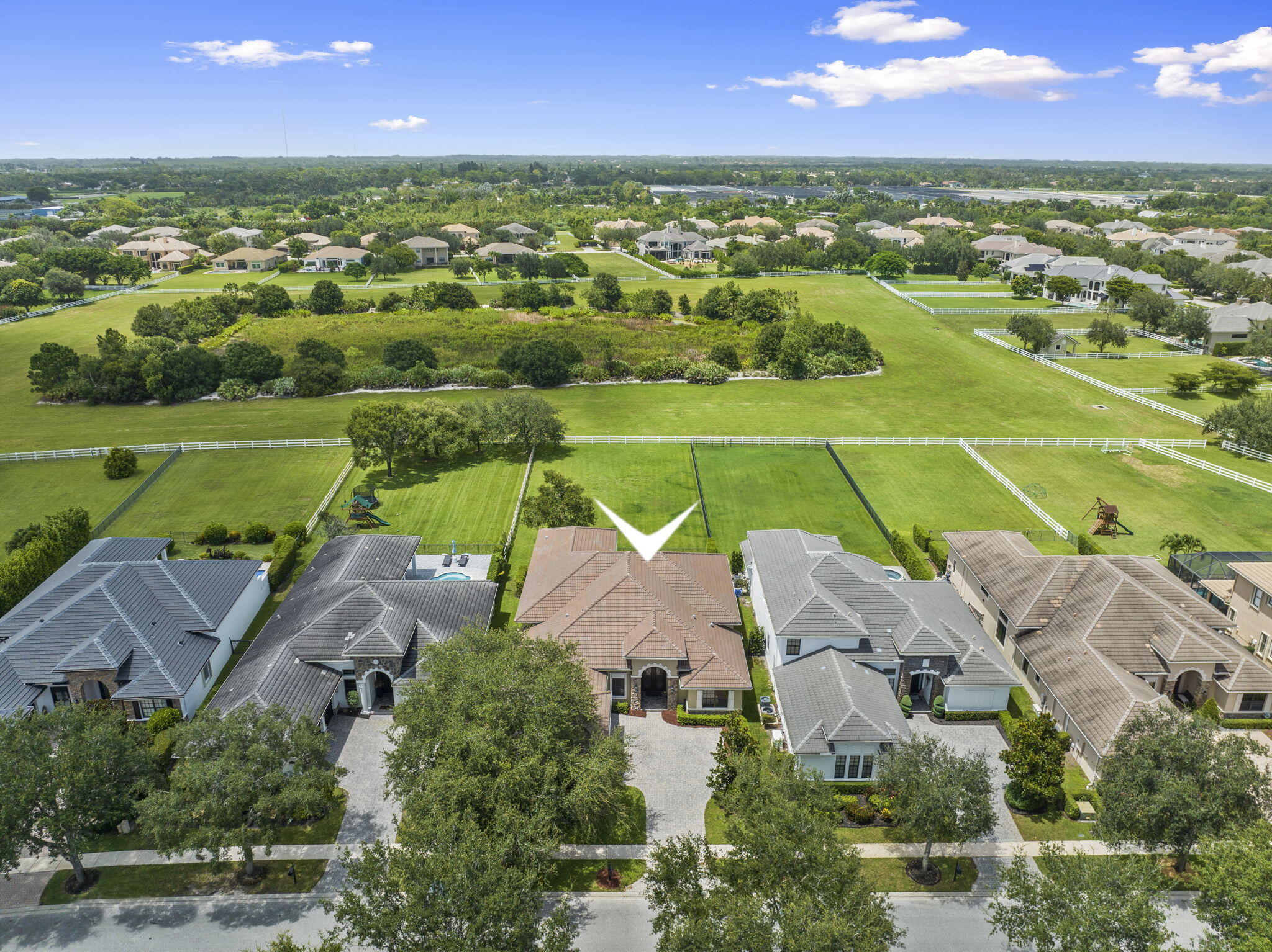 9289 Equus Circle Boynton Beach, FL 33472 - Photo 48 of 72 an aerial view of a houses with outdoor space and a lake view