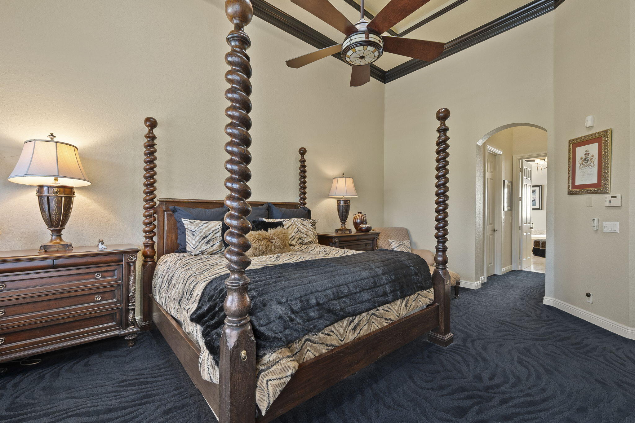 9289 Equus Circle Boynton Beach, FL 33472 - Photo 10 of 72 a bedroom with bed and a chandelier