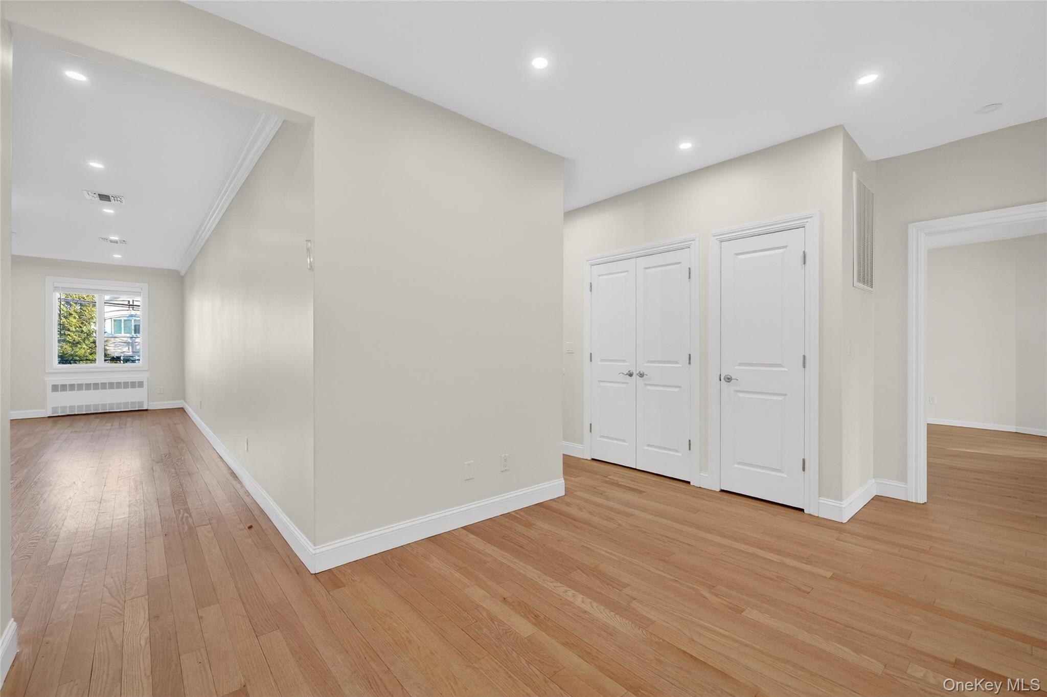 2 Bluefield Drive, Unit 103 Spring Valley, NY 10977 - Photo 12 of 38 a view of entryway with wooden floor