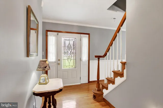 a view of a livingroom with furniture and a window