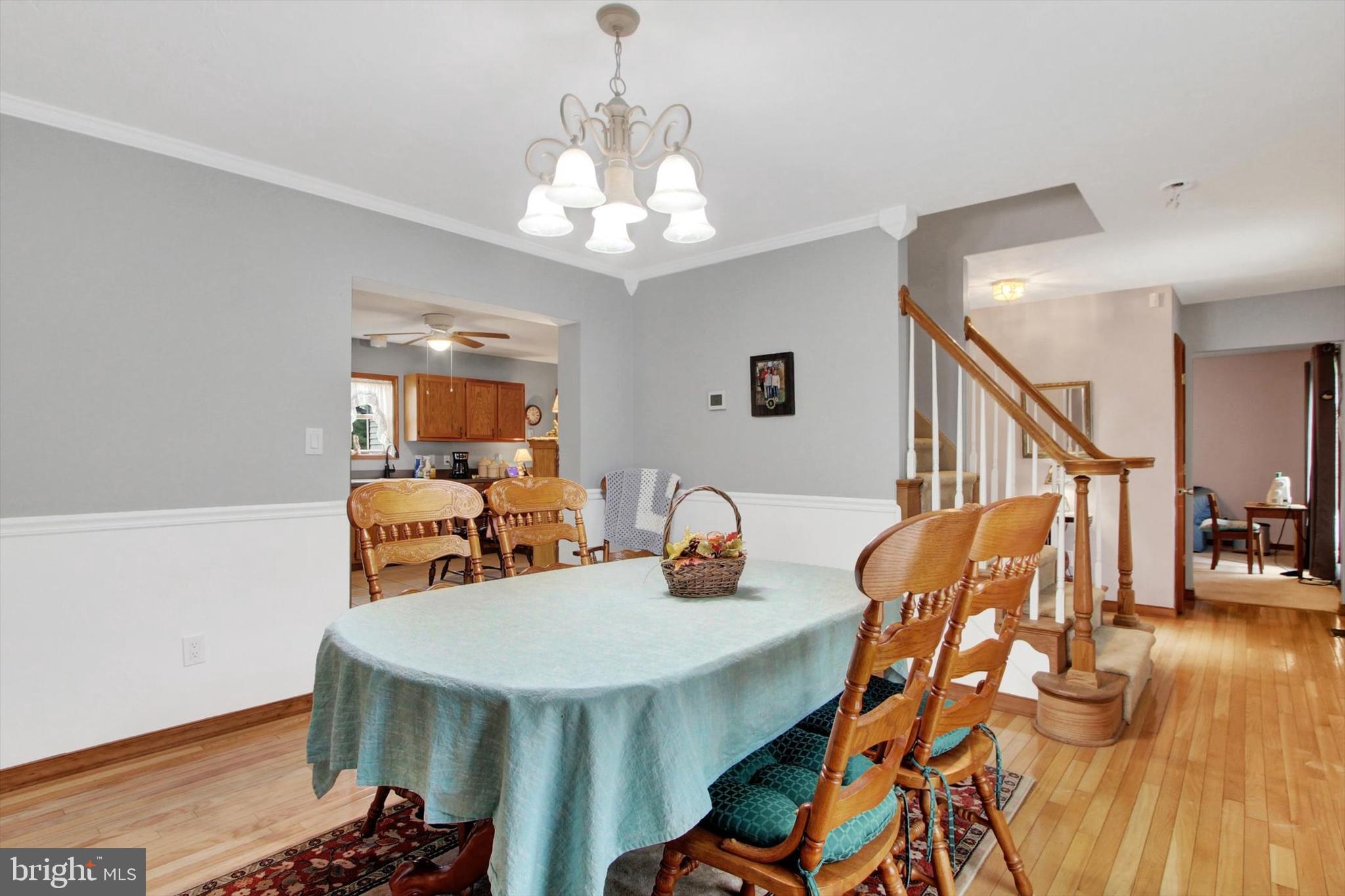 3744 Blue Hill Road Hanover, PA 17331 - Photo 7 of 32 a view of a dining room with furniture and wooden floor