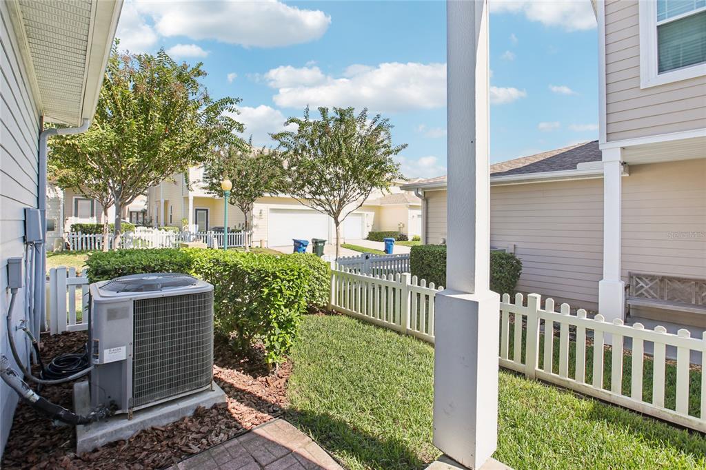270 Cleveland Avenue Southwest Largo, FL 33770 - Photo 8 of 35 a view of a house with a small yard and wooden fence