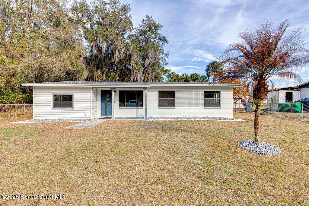 2773 Hickory Circle Mims, FL 32754 - Photo 1 of 45 a house with trees in front of it