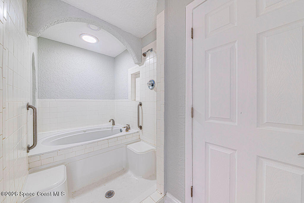 2773 Hickory Circle Mims, FL 32754 - Photo 28 of 45 a bathroom with a toilet a sink and bathtub