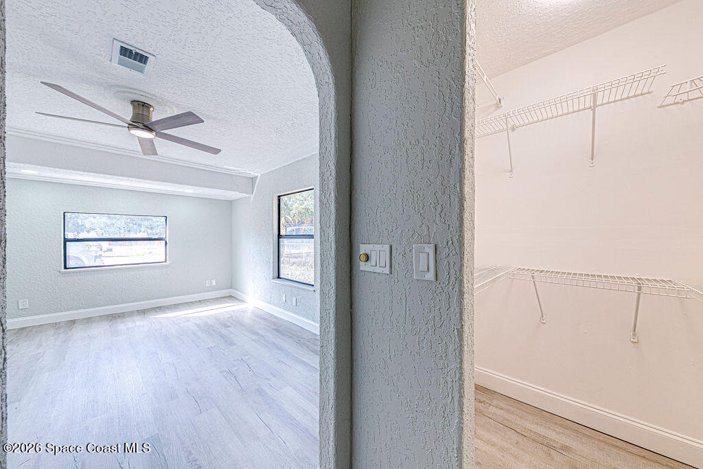 2773 Hickory Circle Mims, FL 32754 - Photo 30 of 45 a view of an empty room with closet and a window