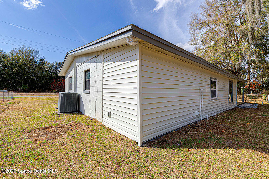 2773 Hickory Circle Mims, FL 32754 - Photo 8 of 45 a view of a house with a yard