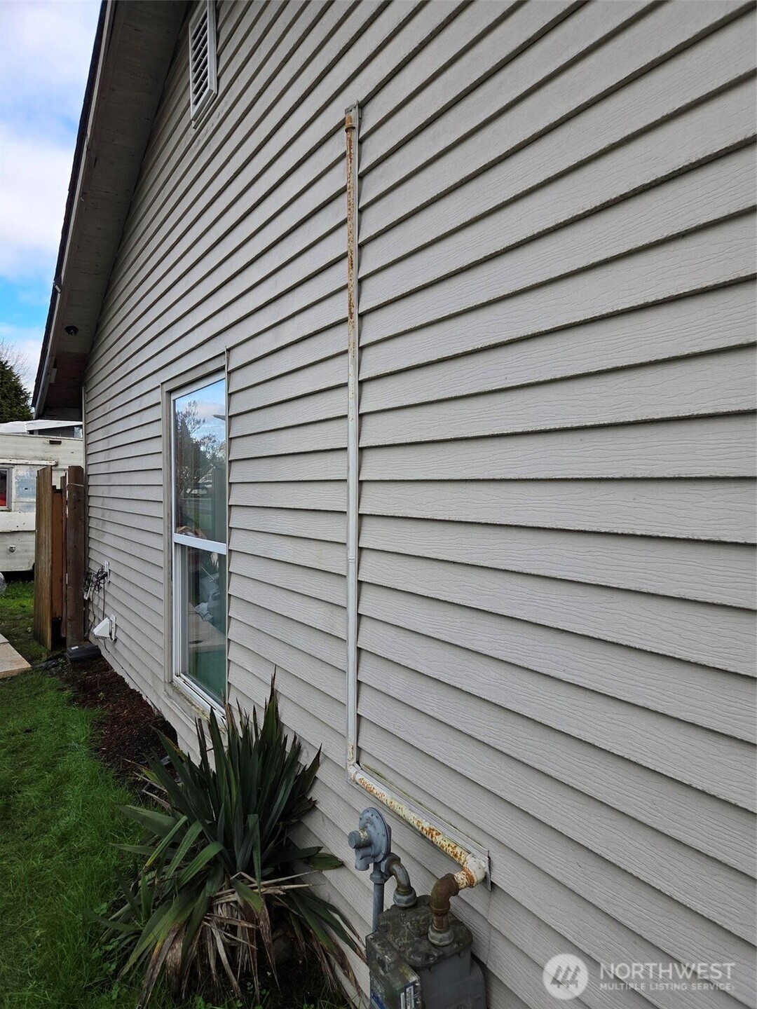 12001 Spanaway Loop Road South Tacoma, WA 98444 - Photo 16 of 20 a view of a house with a garage