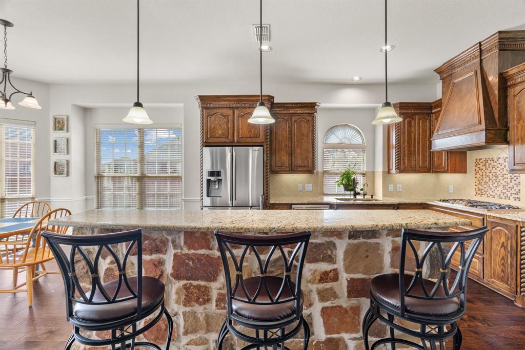 2500 Strathfield Lane Trophy Club, TX 76262 - Photo 14 of 34 Breakfast bar and second sink are perfect for entertaining