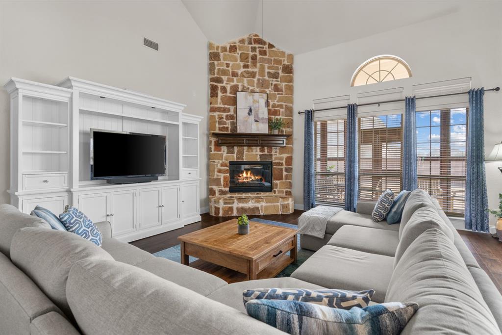 2500 Strathfield Lane Trophy Club, TX 76262 - Photo 5 of 34 Soaring ceilings and stone fireplace